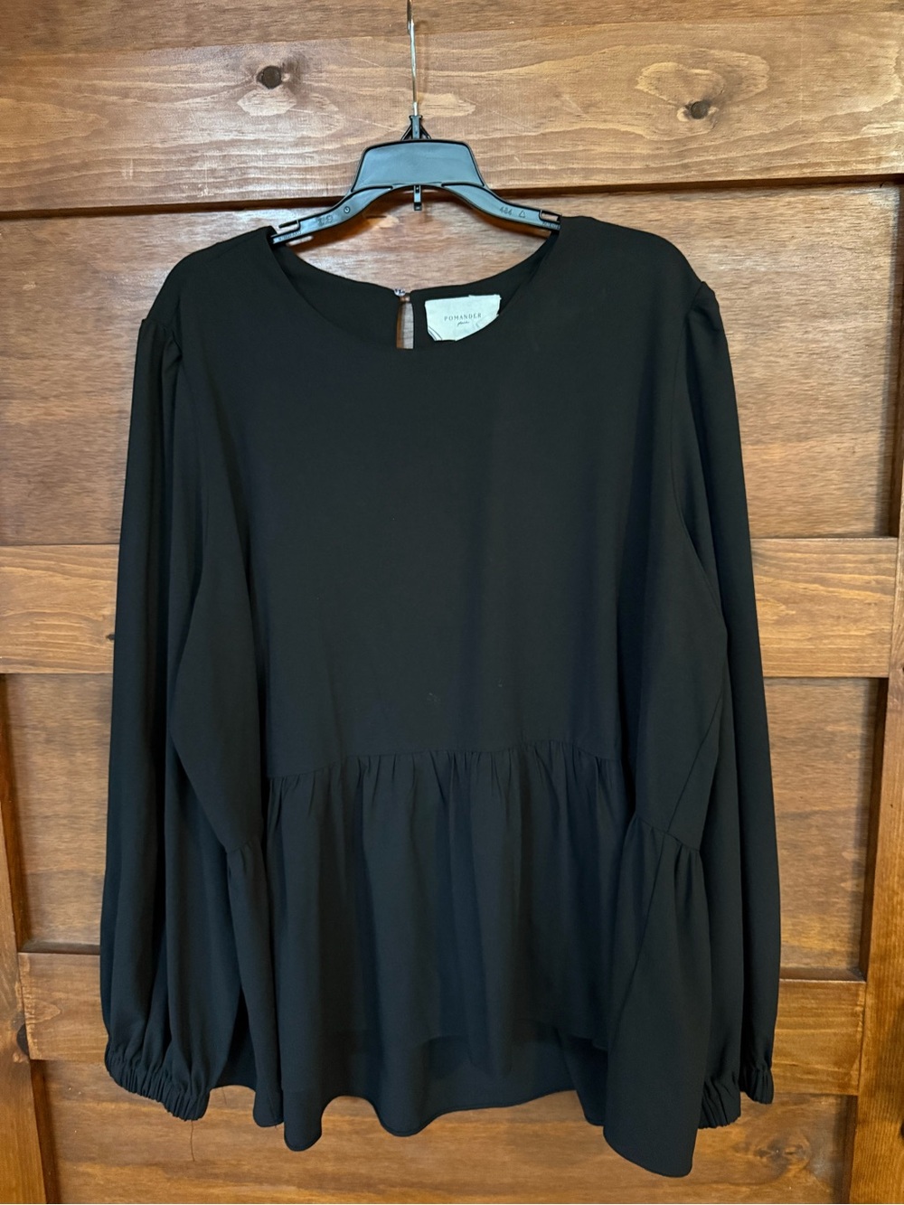 Pomander Place Black Long-Sleeve Peplum Blouse
